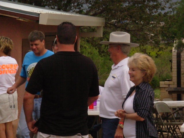 Stan "Moonshine" Martin in blue, Nick (in the hat) and Diane Stewart at the Welcome Party in Marathon