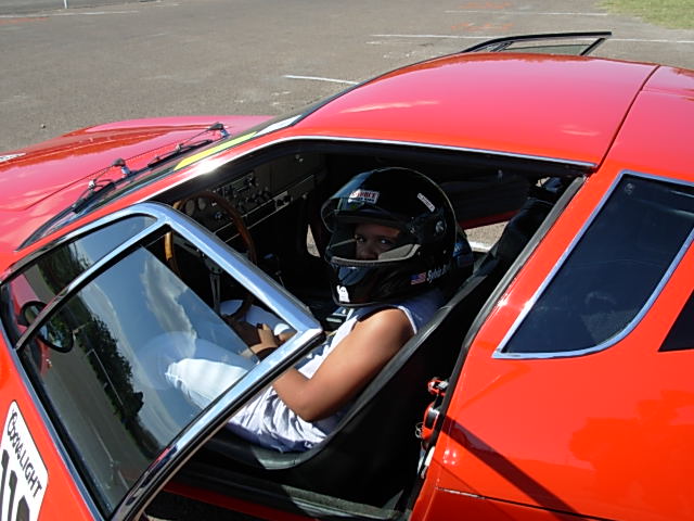 This future race driver wanted to take 'er for a spin around the block.