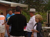 Stan "Moonshine" Martin in blue, Nick (in the hat) and Diane Stewart at the Welcome Party in Marathon