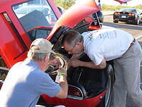 Michael Frazer and Jim Cooper working on the fuel pump.